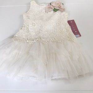 Beautiful and brand new cream  colored dress